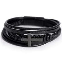 Thumbnail for Close-up of black leather cross bracelet for son with stainless steel cross centerpiece.