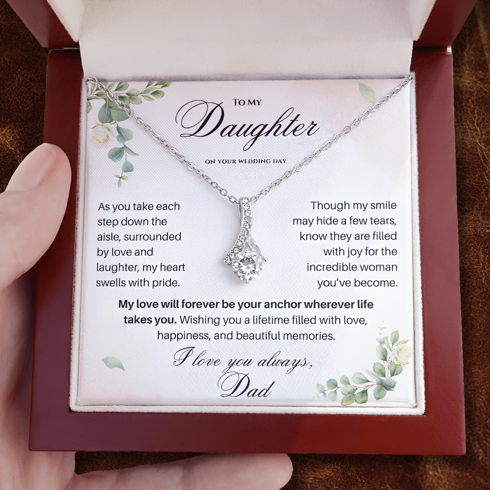 Father holding a meaningful daughter wedding gift necklace with heartfelt message card in a luxury mahogany gift box