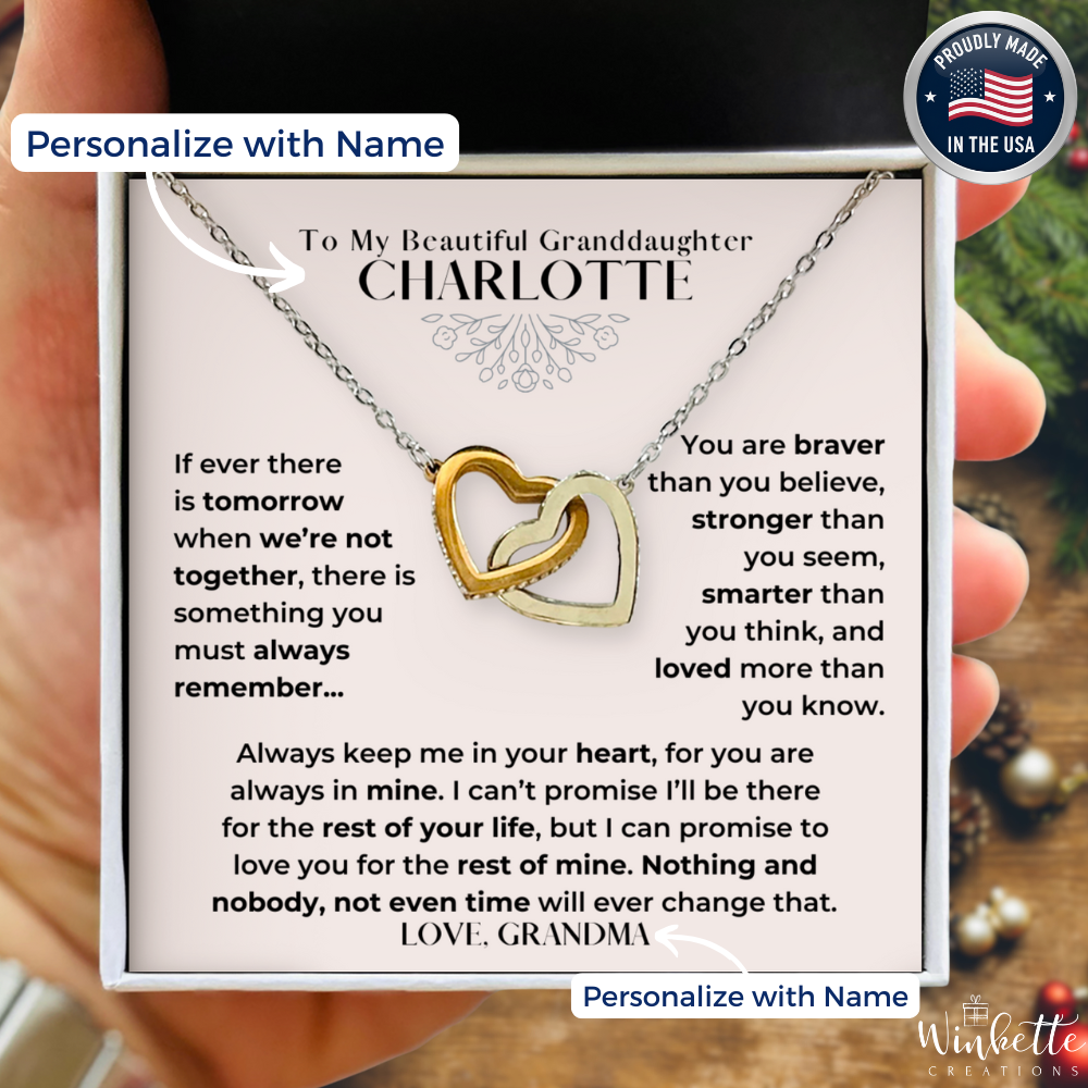 Granddaughter Necklace with interlocking heart pendants on a personalized card held by a hand. Gift from grandma grandpa