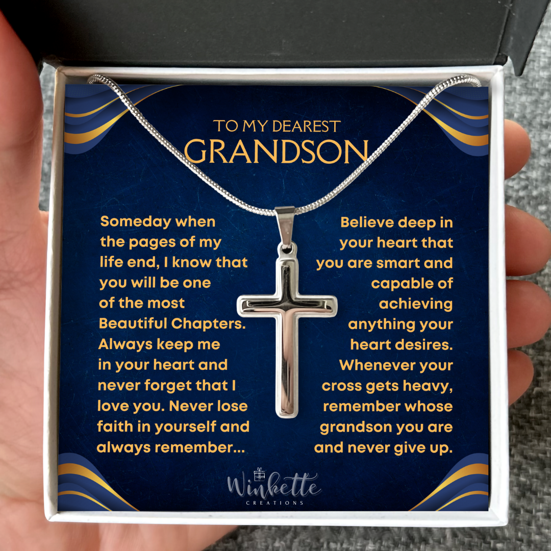 Silver cross necklace in a decorative box with a message for a grandson from grandma grandpa