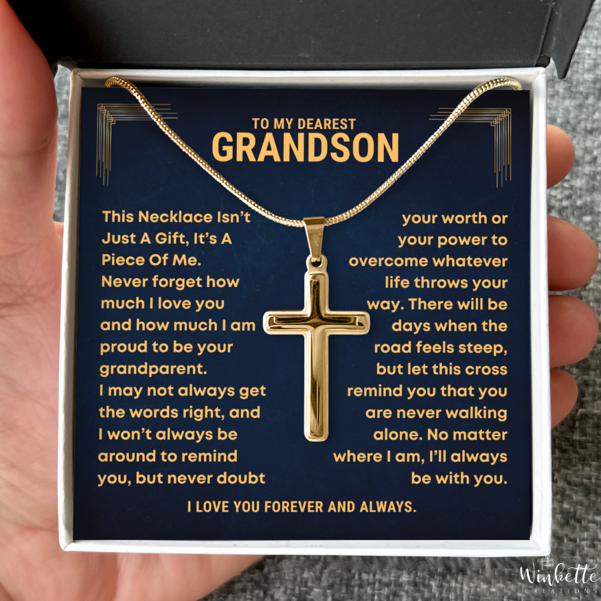 Gold cross necklace in a decorative box with sentimental message for grandson
