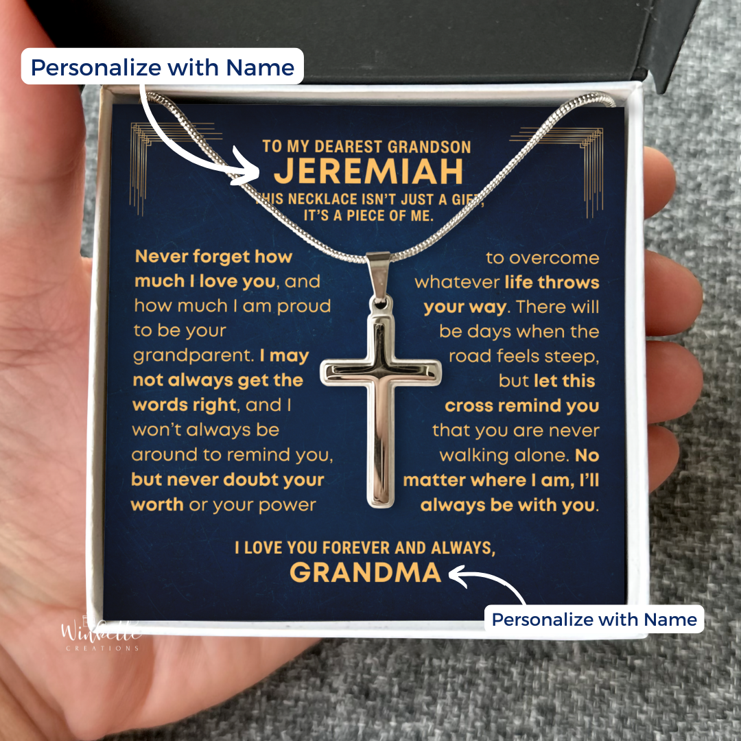Grandson Cross Necklace with cross personalized message card in a box, held by a hand. Gift for grandson from grandma grandpa