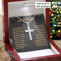 Thumbnail for Silver cross necklace on a card with text, displayed in a red box with LED lighting, Christmas tree in the background. Gift for grandson