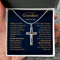 Thumbnail for Silver cross necklace in a gift box with a message to a grandson, held by a hand. Gift for grandson from grandma grandpa.