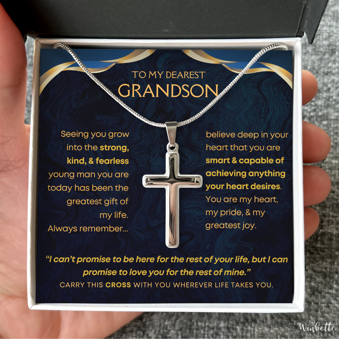 Silver cross necklace in a gift box with a message for a grandson.