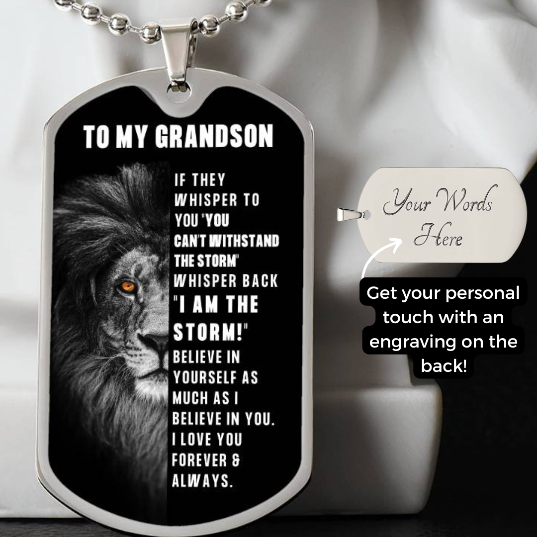 Personalized dog tag silver necklace with a lion graphic and engraved message for a grandson, shown with a chain and a callout note explaining custom text on the back.