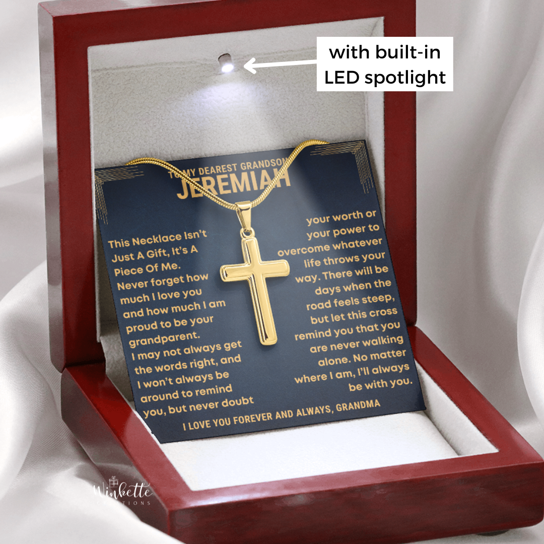 Gold Cross necklace in a luxury box with personalized message, held by a hand. gift for grandson from grandfather.