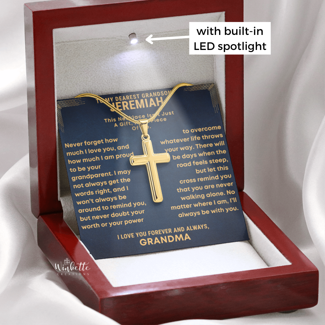 Gold Cross necklace in a luxury box with personalized message, held by a hand. gift for grandson from grandfather.