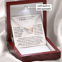 Thumbnail for Granddaughter Necklace in a wooden display box with a built-in LED spotlight, featuring a sentimental message.