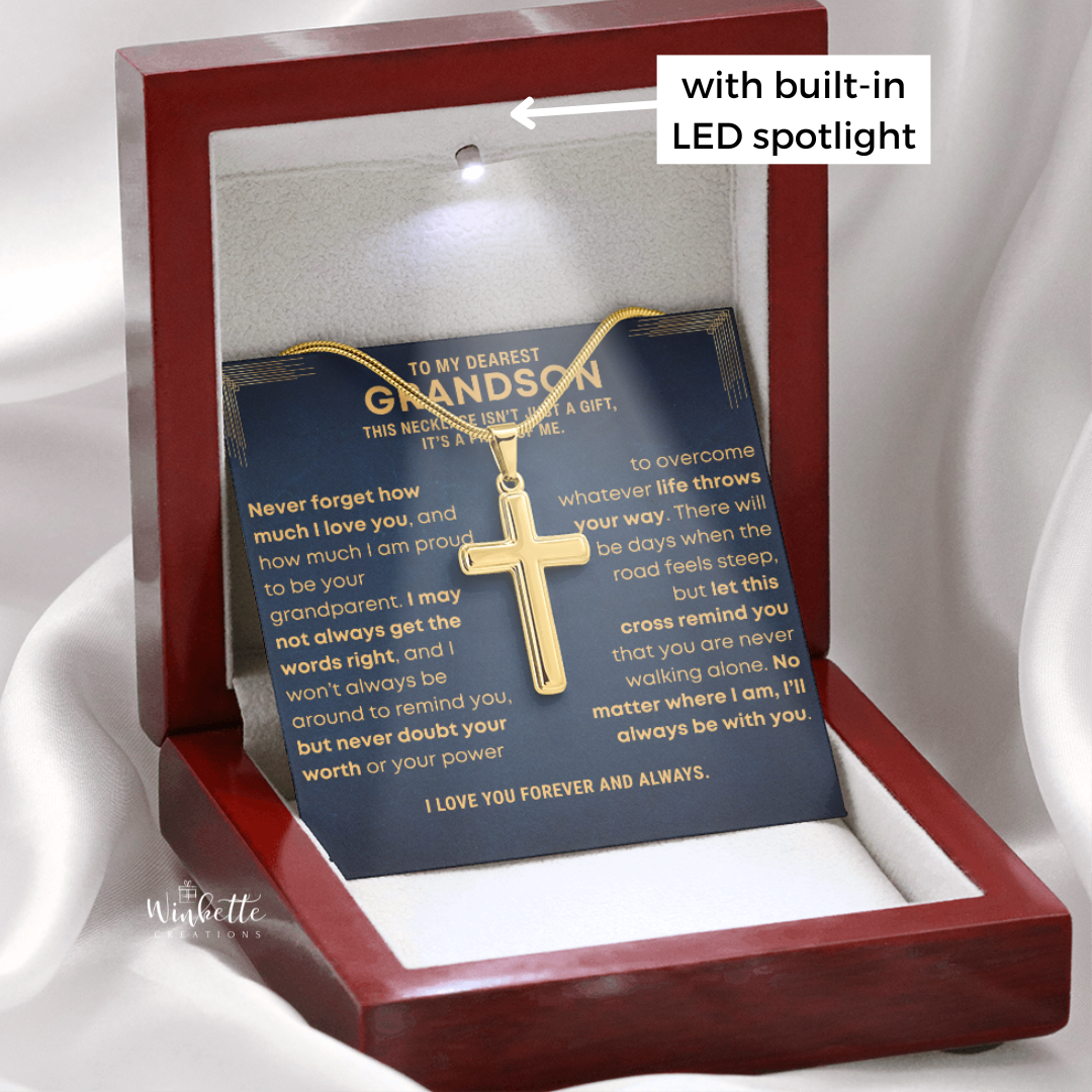 Gold cross necklace in a red display box with a sentimental message card, featuring a built-in LED spotlight. gift for grandson from nana pop pop