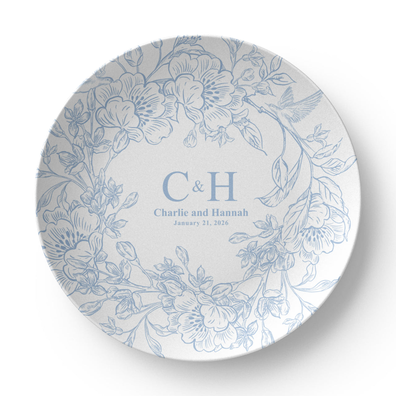 Personalized polymer wedding plate featuring a blue floral wreath with custom couple names, initials, and wedding date on a clean white background.