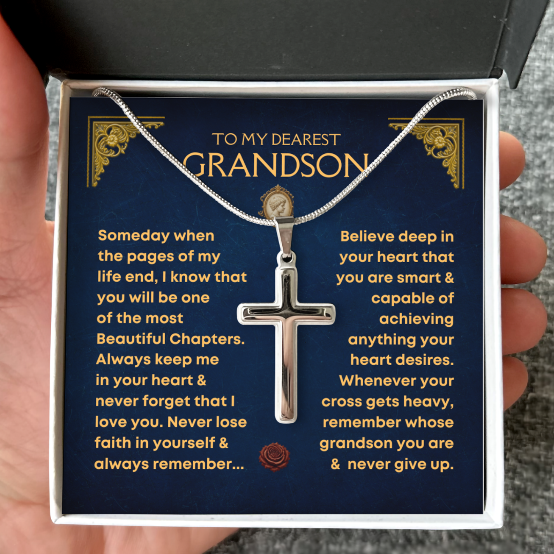 Silver cross necklace displayed in a gift box with a blue message card that reads "To My Dearest Grandson." Inspirational message encourages faith, strength, and perseverance, making it a meaningful Christian gift for a grandson on his birthday, graduation, Christmas, back to school or other special occasions.