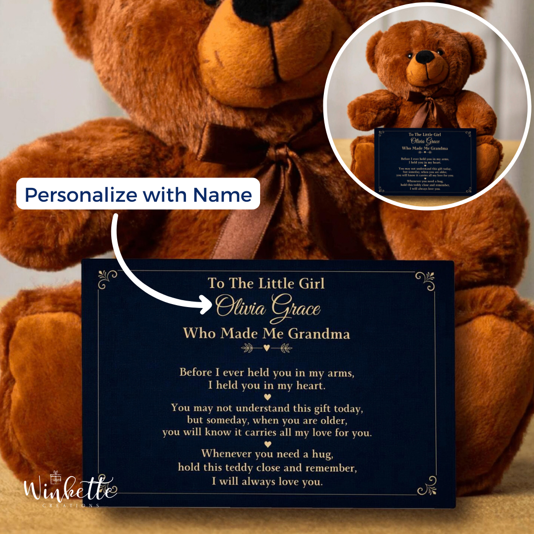 A large brown teddy bear holding a navy blue personalized memorial plaque, with a circular inset showing the plaque attached to a smaller teddy bear. White text on the plaque reads 'To The Little Girl Olivia Grace Who Made Me Grandma' with a memorial message.
