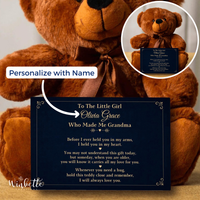 Thumbnail for A large brown teddy bear holding a navy blue personalized memorial plaque, with a circular inset showing the plaque attached to a smaller teddy bear. White text on the plaque reads 'To The Little Girl Olivia Grace Who Made Me Grandma' with a memorial message.