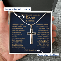 Thumbnail for Silver cross necklace in a gift box with a personalized message card to a grandson, held by a hand. Graduation Gift for grandson from grandma grandpa.