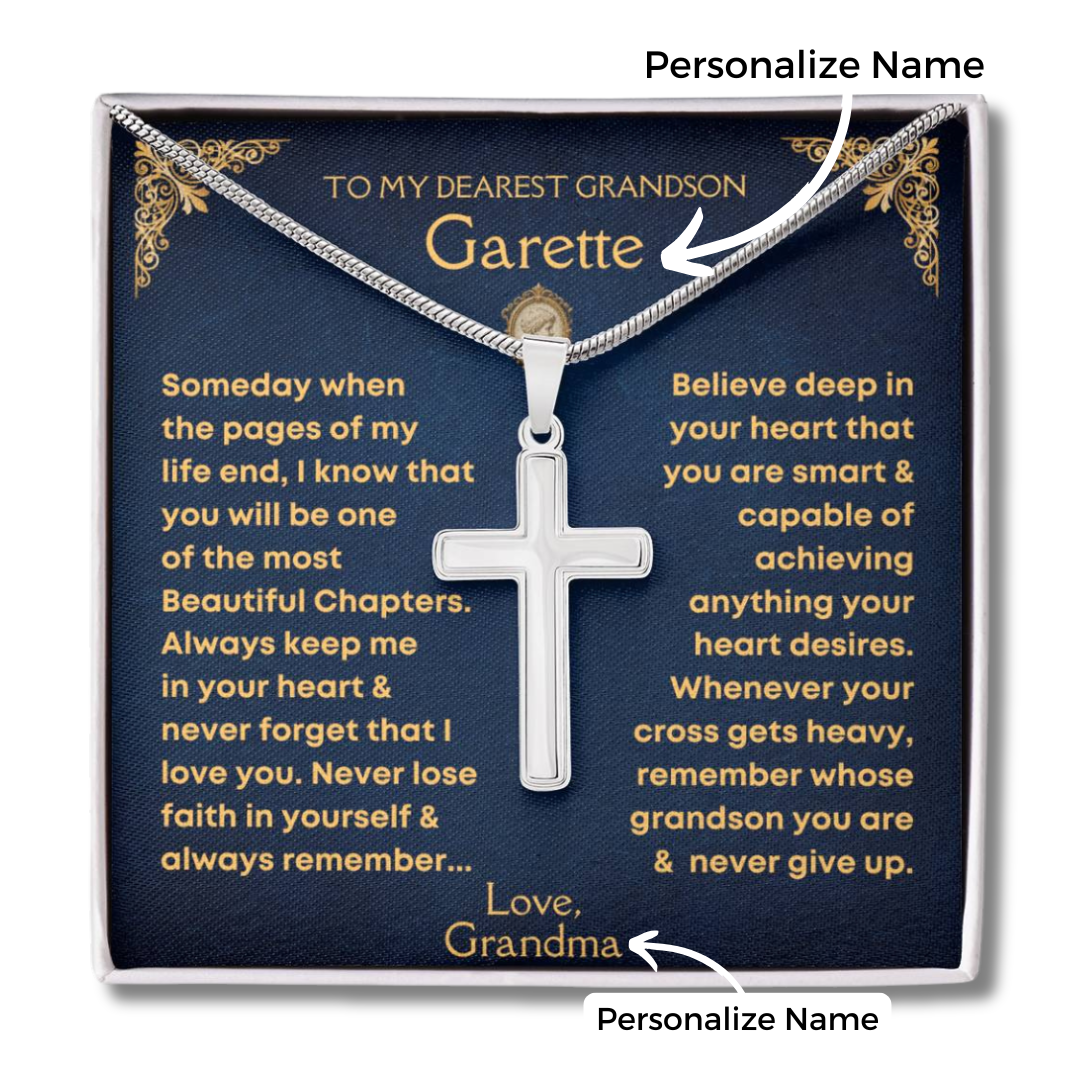 Personalized silver cross pendant necklace displayed on a dark blue gift card with gold text and arrows pointing to customizable name fields. The necklace is shown against a plain white background.