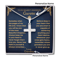 Thumbnail for Personalized silver cross pendant necklace displayed on a dark blue gift card with gold text and arrows pointing to customizable name fields. The necklace is shown against a plain white background.