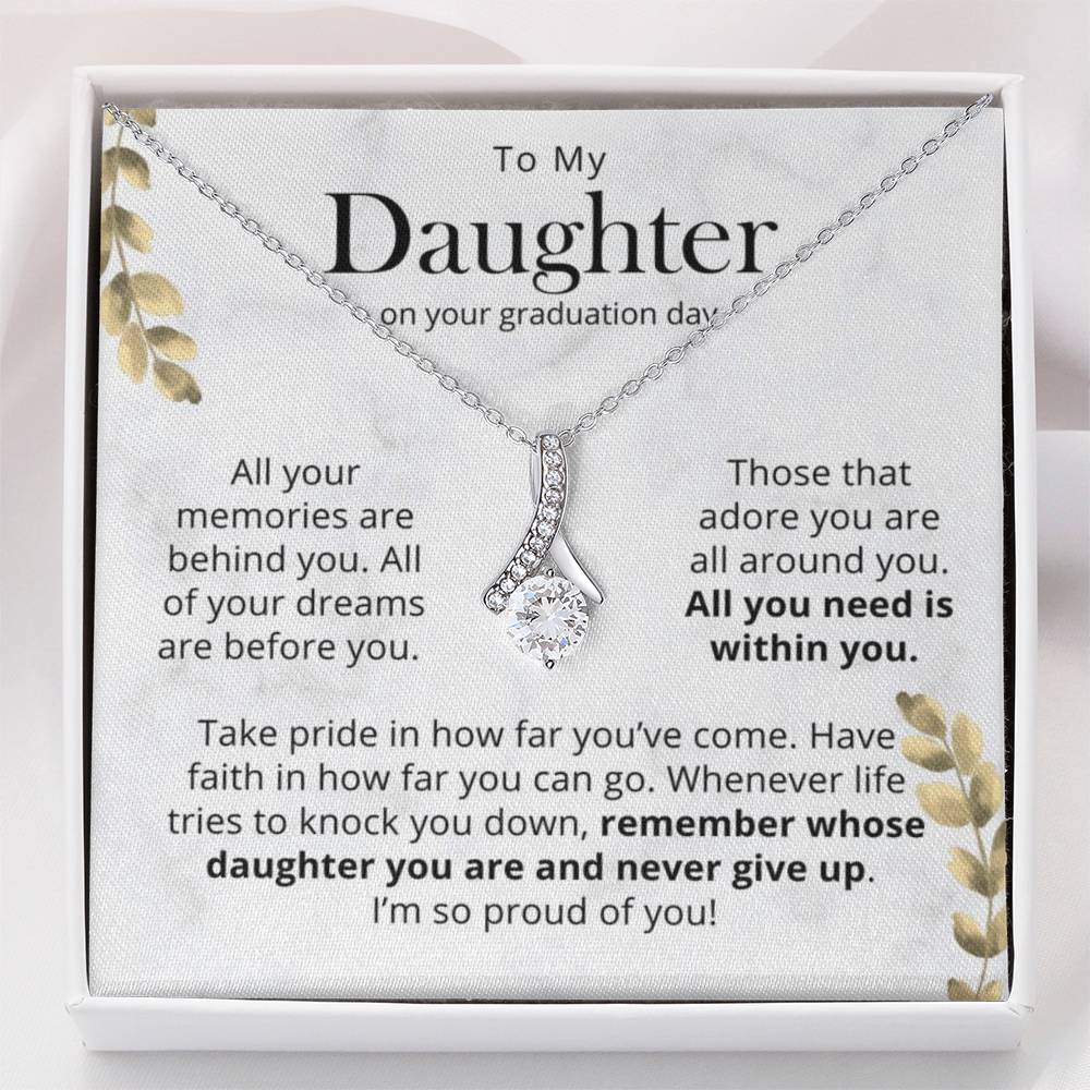 Daughter graduation necklace with inspirational message card displayed in gift box, meaningful graduation gift for daughter from parent