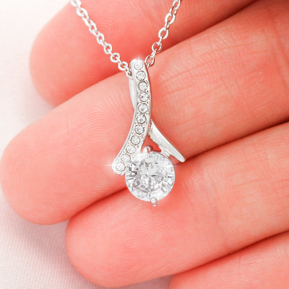 Close-up of the Alluring Beauty Necklace featuring a sparkling cubic zirconia pendant