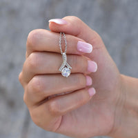 Thumbnail for Alluring Beauty Necklace held in hand showing pendant size and elegant design