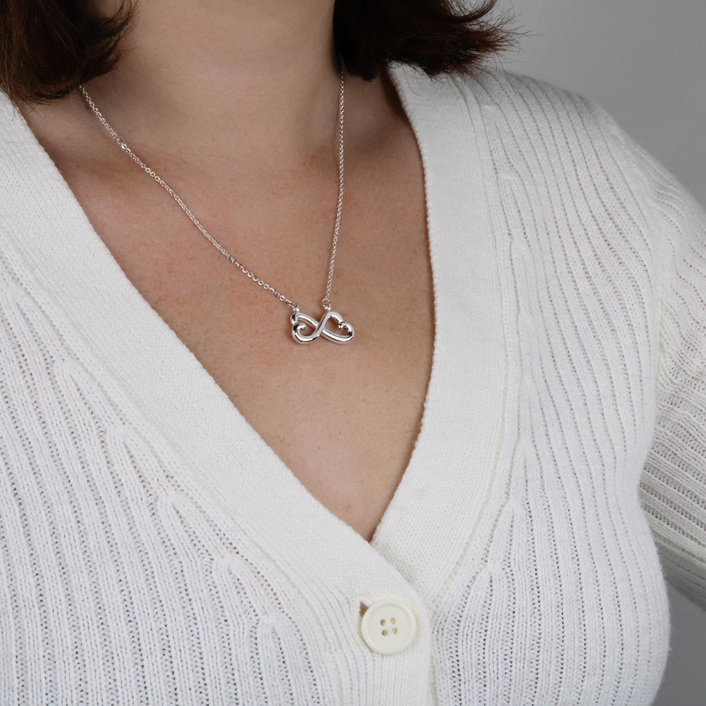 Infinity Hearts necklace with 'Proud of You' message card – meaningful gift for daughter to celebrate her accomplishments.