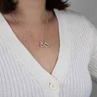 Thumbnail for Infinity Hearts necklace with 'Proud of You' message card – meaningful gift for daughter to celebrate her accomplishments.