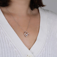 Thumbnail for Romantic heart-shaped pendant necklace with sparkling cubic zirconia.