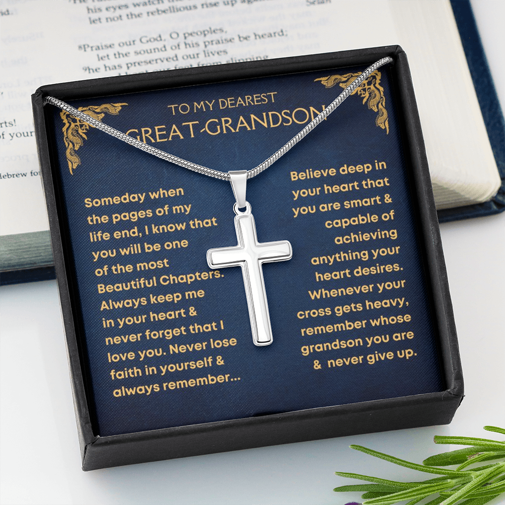 A silver cross necklace on a chain, presented in a gift box with a message card for a great-grandson.