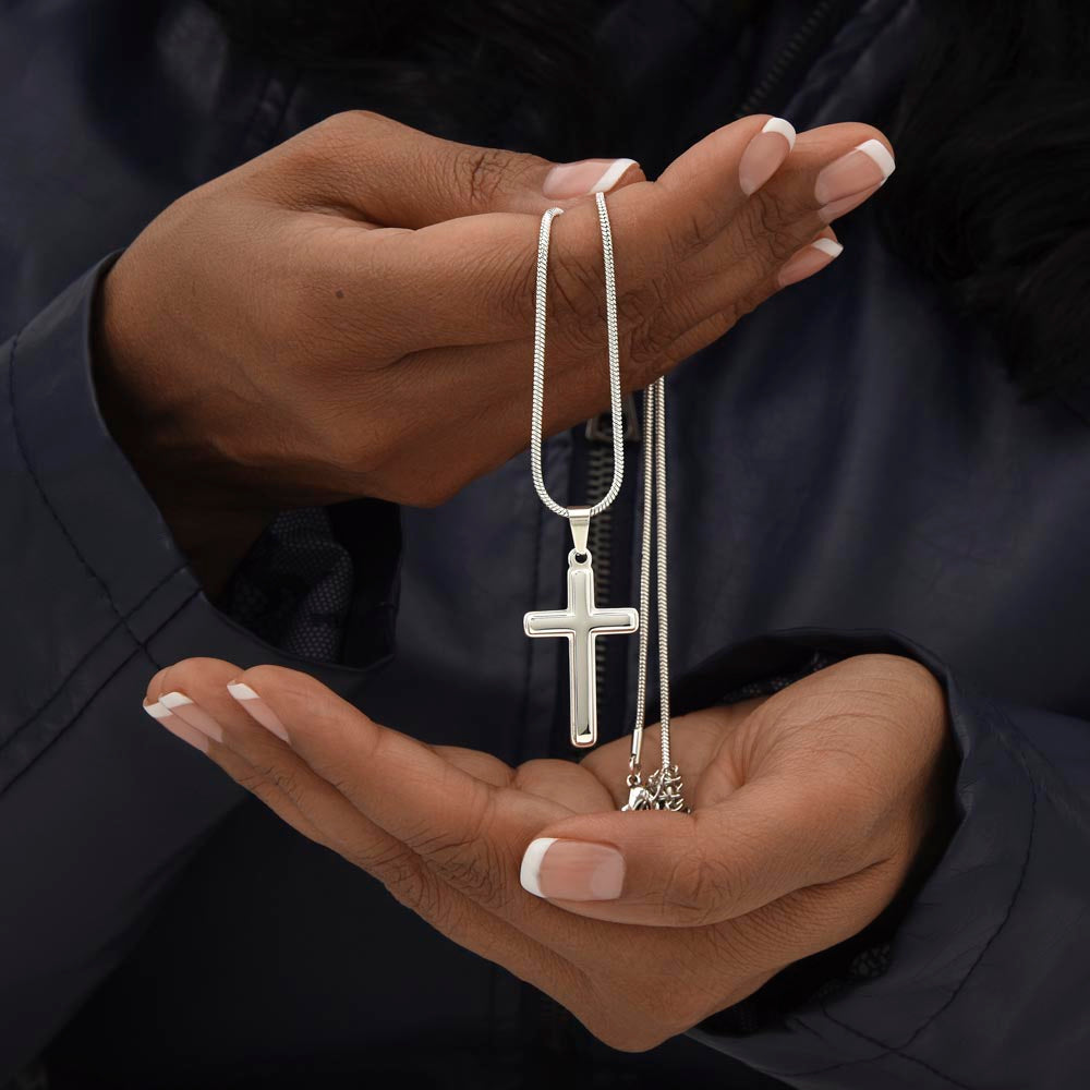 A silver cross necklace for grandson.