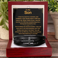 Thumbnail for A black cross bracelet with handcrafted braided vegan leather, presented in a luxury box with a personal message for a son. Gift for son from parents