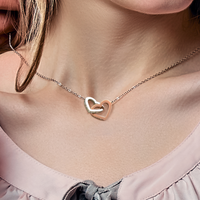 Thumbnail for Elegant interlocking hearts necklace symbolizing love – heartfelt gift for daughter.